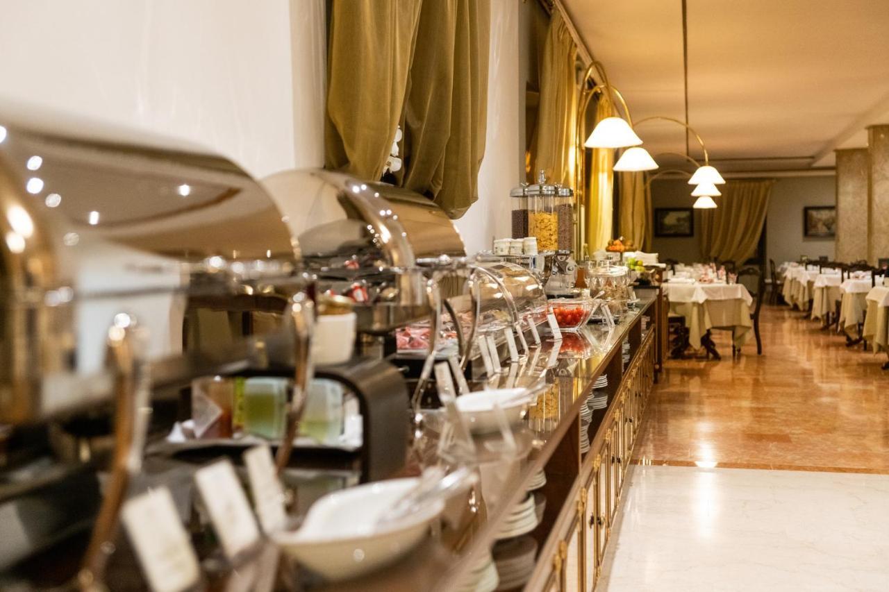 Due Torri Hotel Verona Bagian luar foto